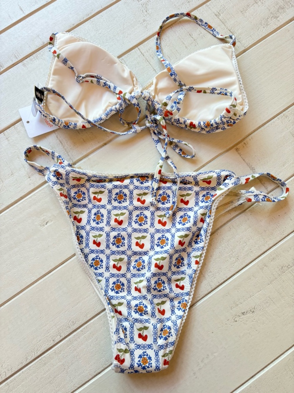 Dippin' Daisy's Cream Bikini with Blue Floral & Red Cherry Print - Picture 2 of 3